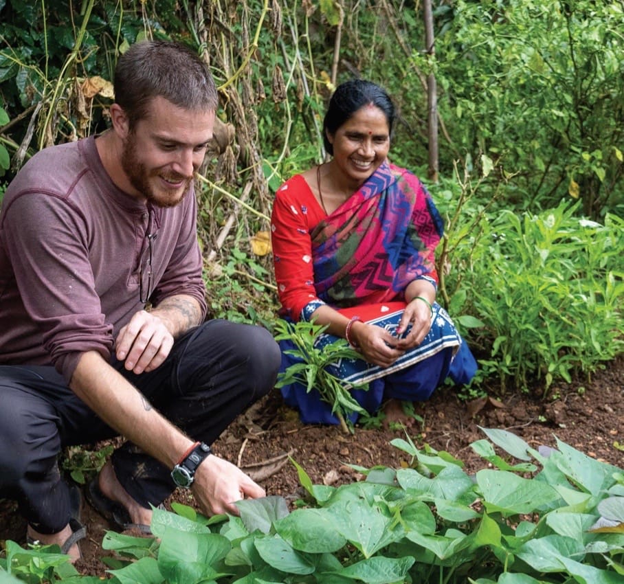 Connor with a Nepali farmer